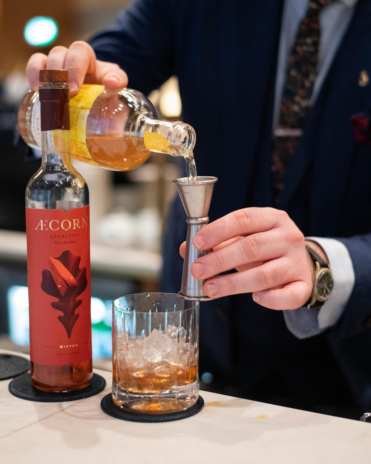 Middle Eight - Covent Garden - Preferred Hotels And Resorts London Exterior photo A bartender using a jigger to measure a pour